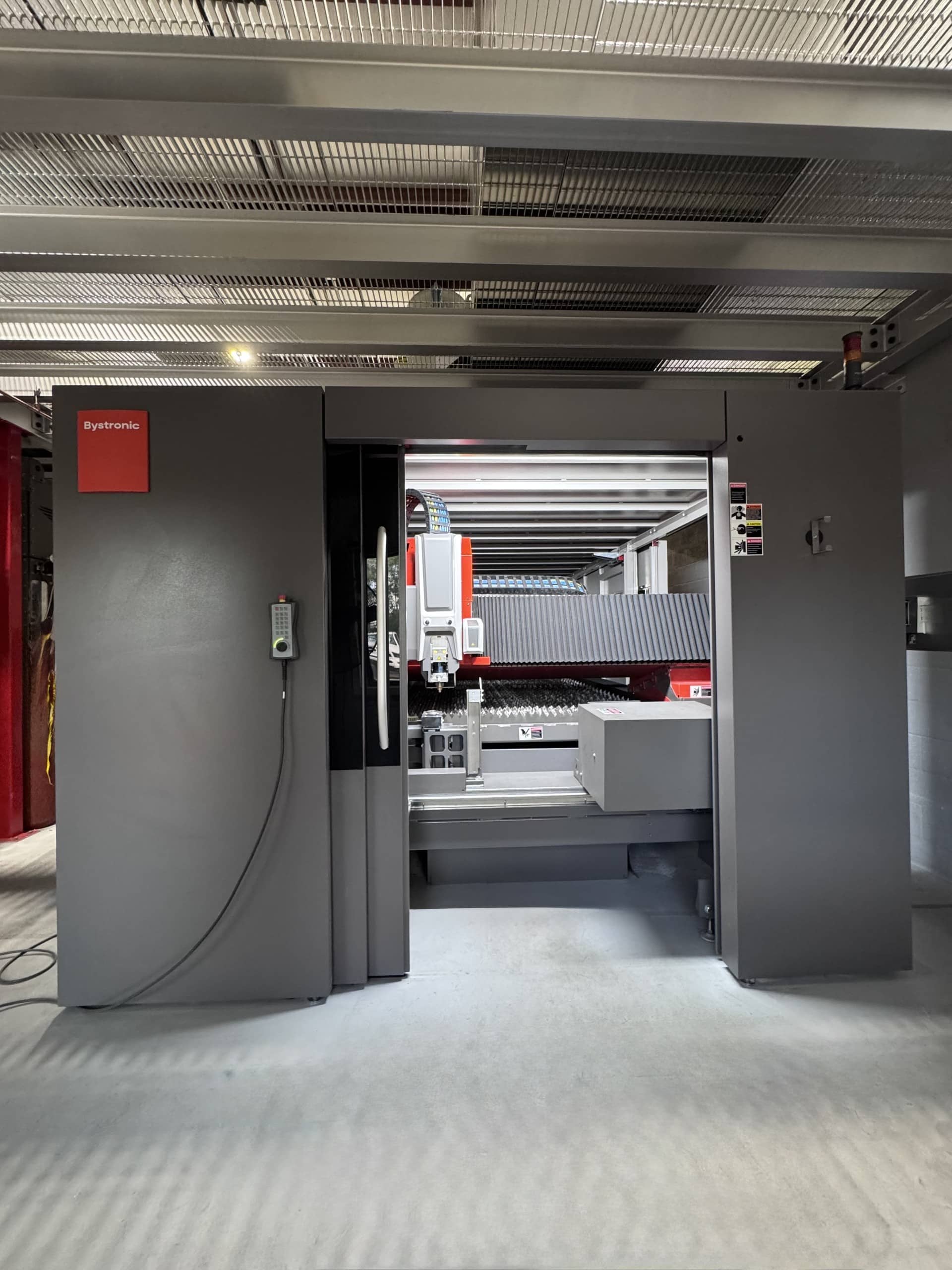 Freedom Fabricators CNC Laser Cutting Bystronic CNC laser cutting machine at Freedom Fabricators