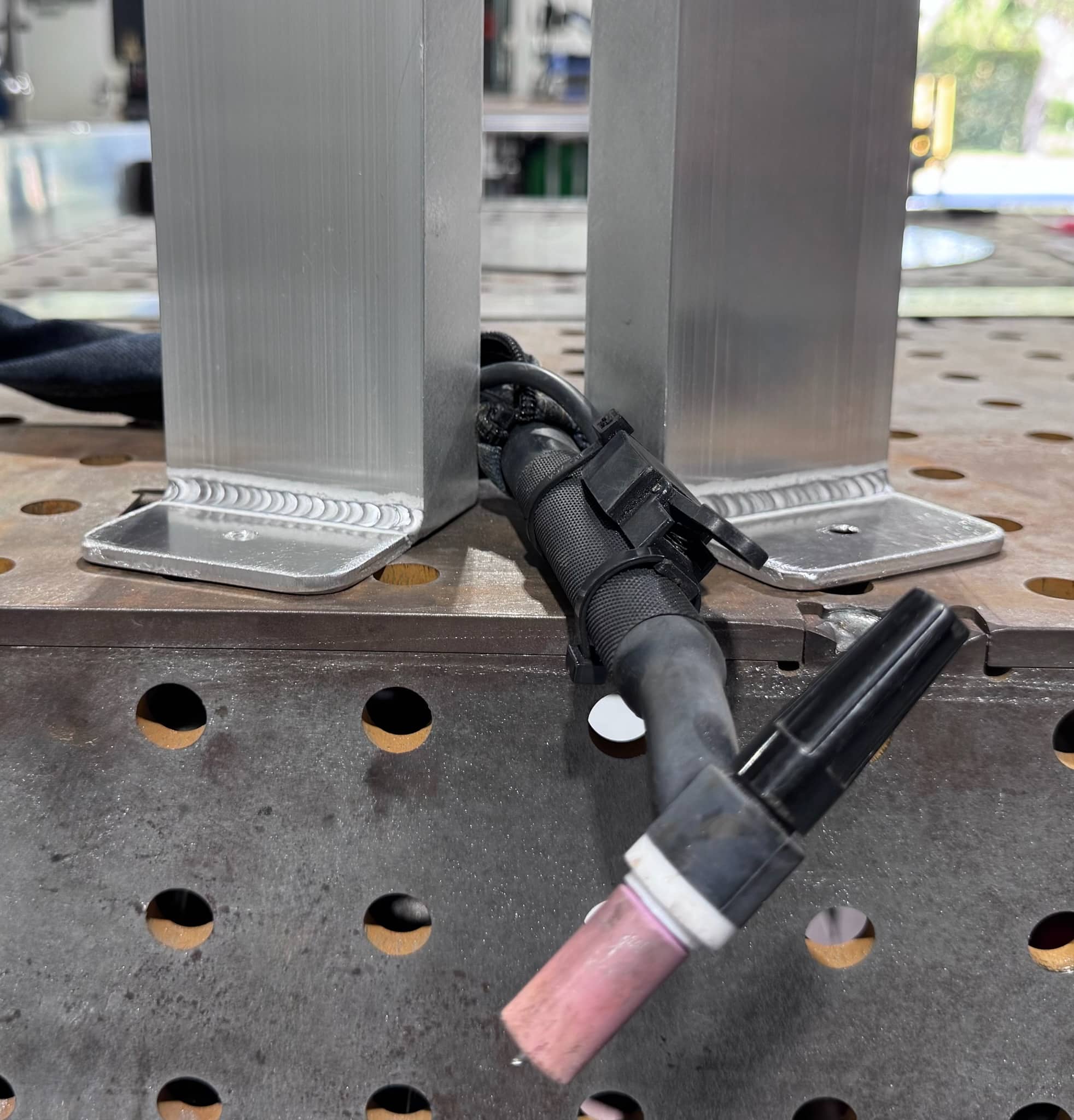 Close-up of welded metal fabrication completed by Freedom Fabricators